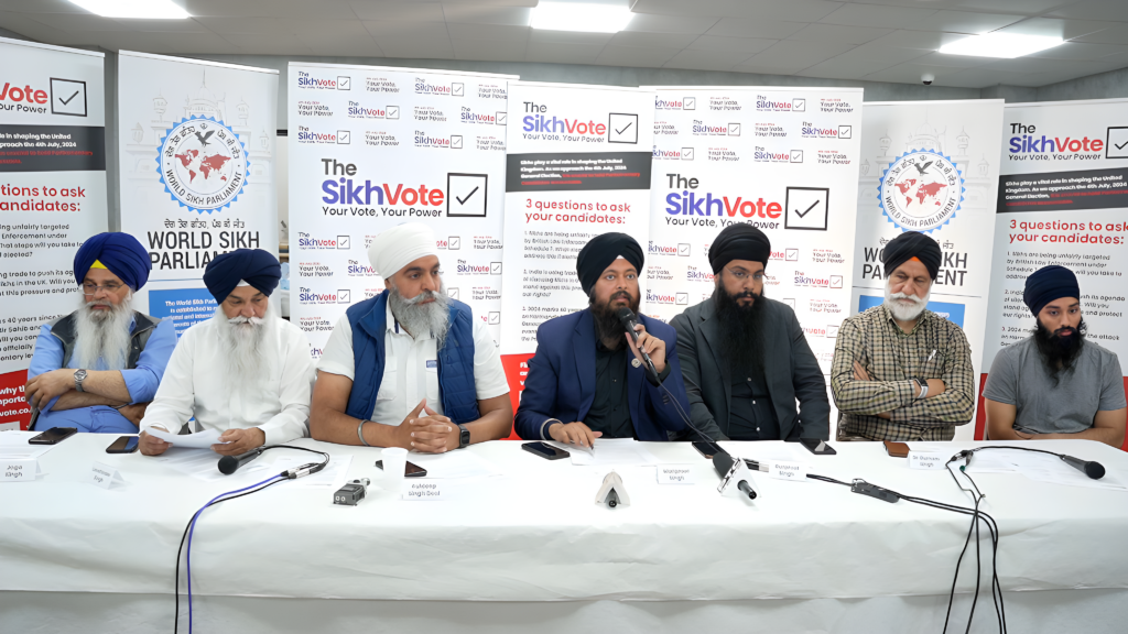 Manpreet Singh, Lead Coordinator of the Sikh Vote addressing press at the launch of the Sikh Vote campaign. Pictured left to right: Joga Singh, Lavshinder Singh, Kuldip Singh Deol, Manpreet Singh, Gurpreet Singh, Dr Gurnam Singh and Maniv Singh.